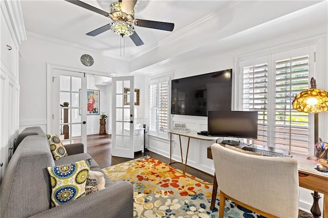 living room featuring dark hardwood / wood-style flooring, a wealth of natural light, french doors, and ceiling fan