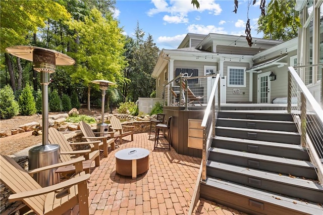 view of patio / terrace with an outdoor fire pit