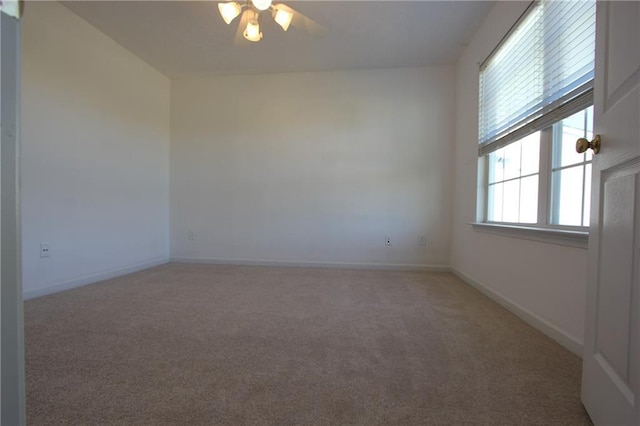 838 Roxholly Ln, Buford, GA 30518 - empty room with ceiling fan, light carpet, and baseboards