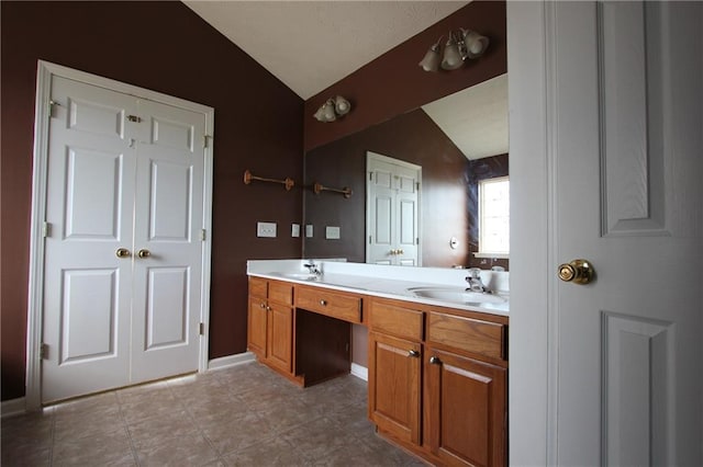838 Roxholly Ln, Buford, GA 30518 - bathroom featuring lofted ceiling and double vanity