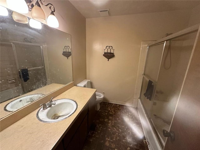 full bath featuring a stall shower, visible vents, vanity, and toilet