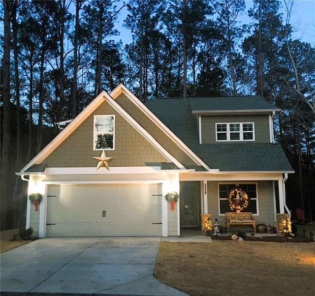 craftsman-style house featuring a garage