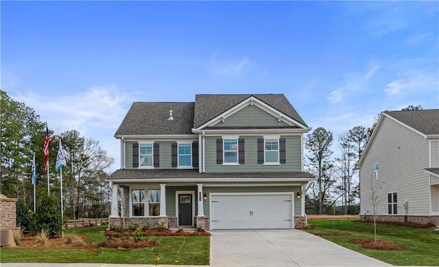 craftsman-style house with a front lawn and a garage