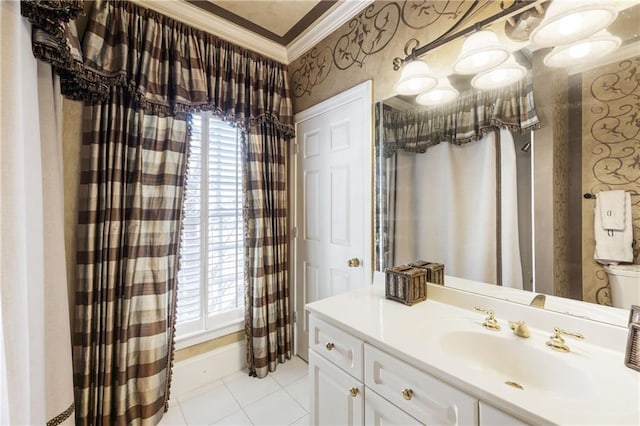 bathroom featuring a healthy amount of sunlight, vanity, wallpapered walls, and crown molding