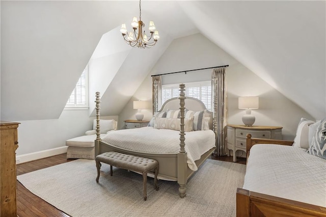 bedroom featuring baseboards, a notable chandelier, wood finished floors, and vaulted ceiling