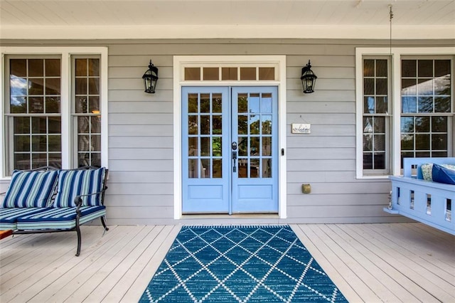 property entrance featuring french doors