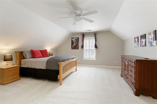 bedroom with a ceiling fan, visible vents, baseboards, lofted ceiling, and light carpet