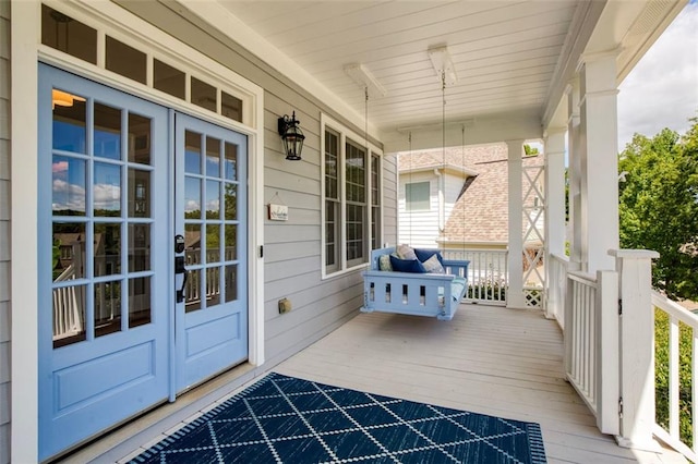 wooden terrace with covered porch