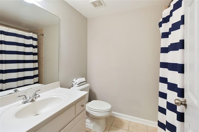 bathroom featuring vanity, visible vents, curtained shower, tile patterned floors, and toilet