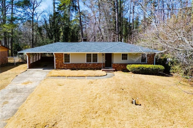 ranch-style house with a carport