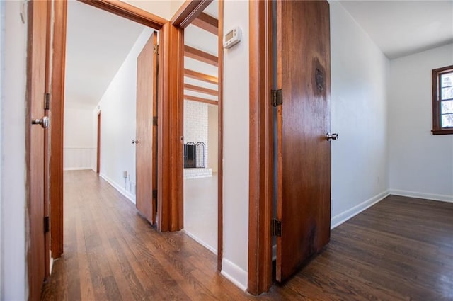 hall featuring dark wood-type flooring