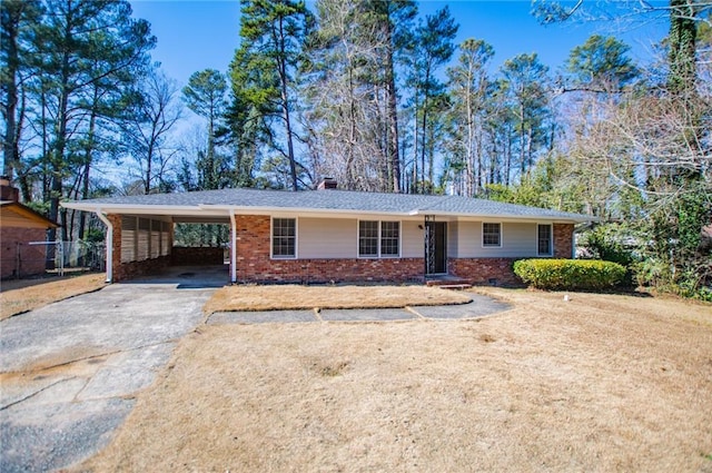 ranch-style home with a carport