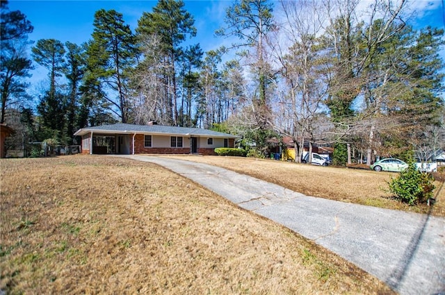 single story home featuring a front yard