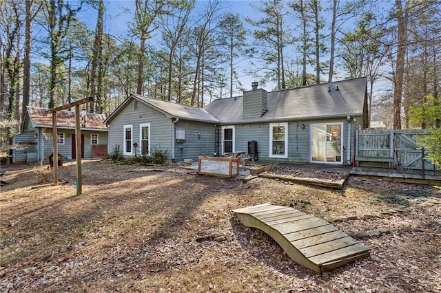 rear view of house featuring a patio