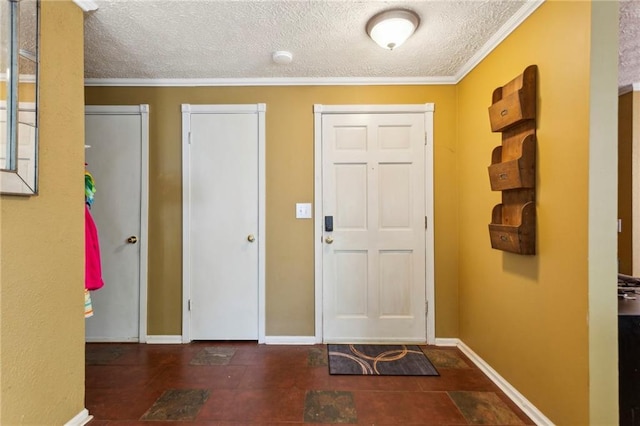 entryway with crown molding and a textured ceiling