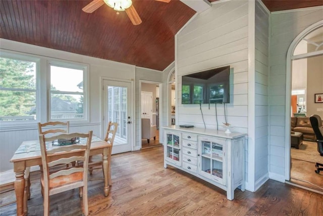 dining room featuring hardwood / wood-style floors, wood ceiling, ceiling fan, and lofted ceiling