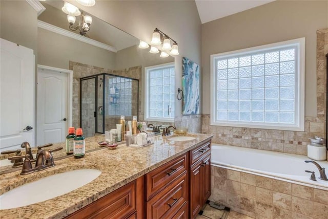 bathroom featuring double vanity, plus walk in shower, ornamental molding, a chandelier, and tile floors