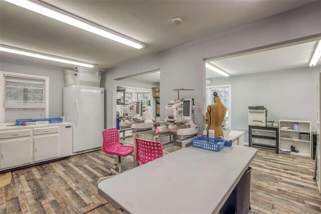 dining area with light hardwood / wood-style flooring