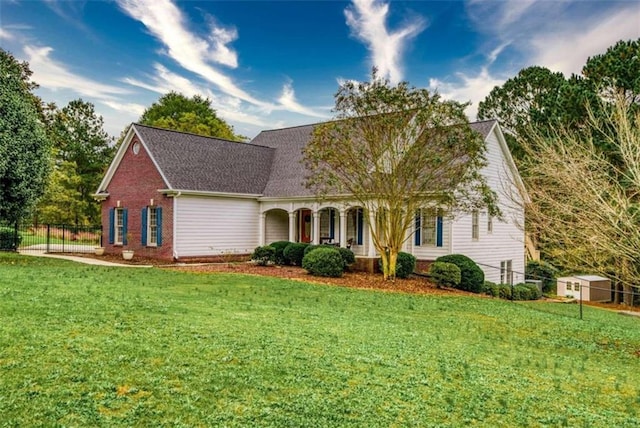 view of front of property with a front lawn