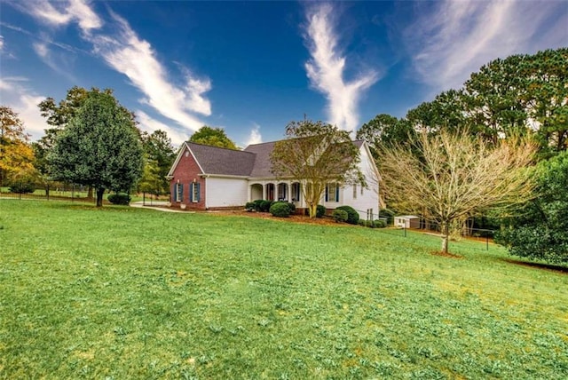 view of front of property with a front lawn