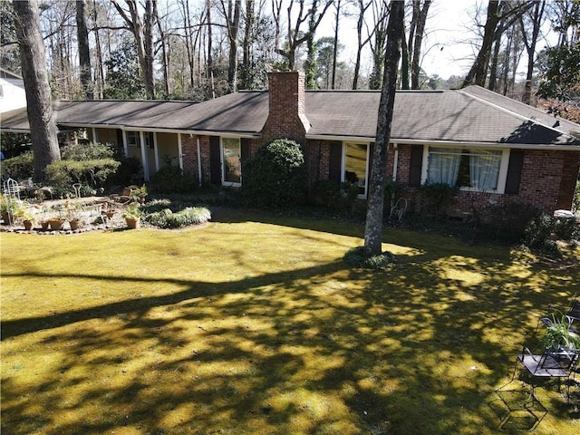 ranch-style home with a front yard