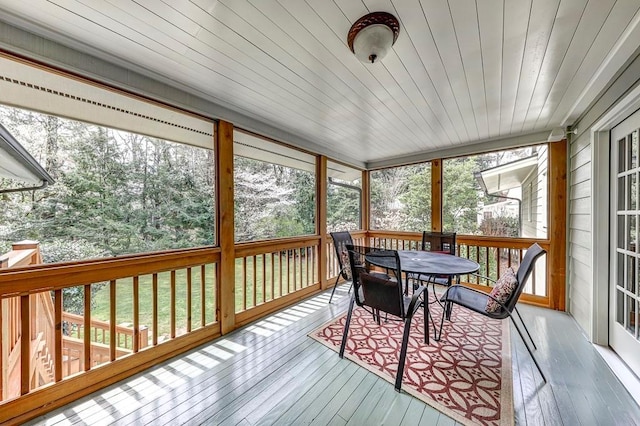 sunroom / solarium with wood ceiling