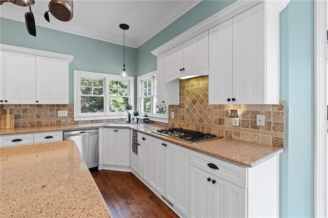 kitchen featuring decorative light fixtures, backsplash, dark hardwood / wood-style flooring, and stainless steel appliances