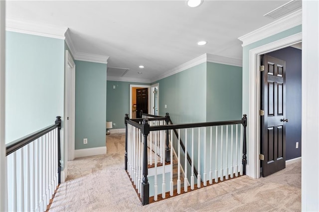 corridor featuring crown molding and light colored carpet