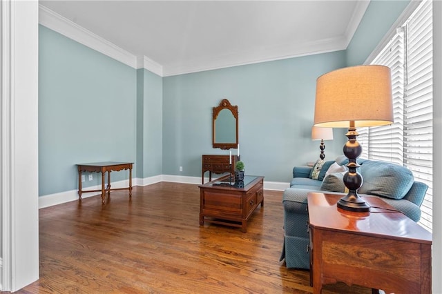 living area featuring crown molding and dark wood-type flooring