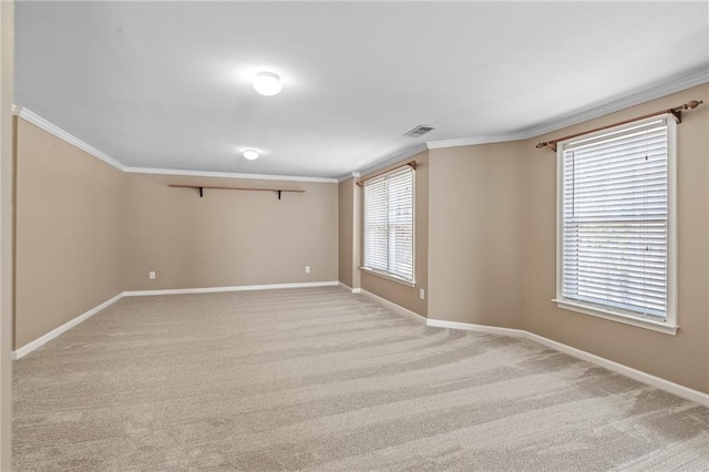 carpeted empty room with ornamental molding