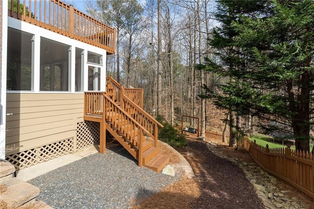 exterior space featuring a sunroom