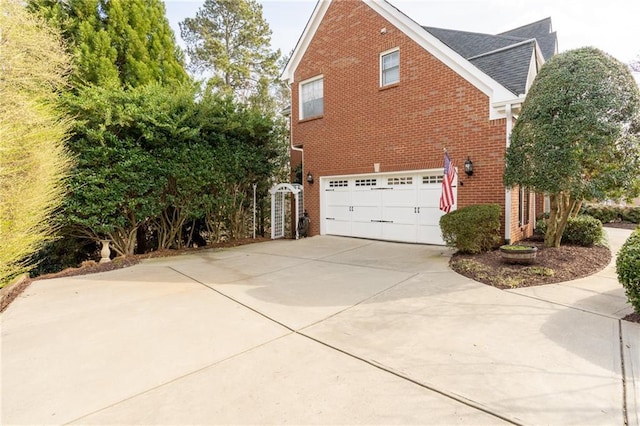 view of property exterior with a garage