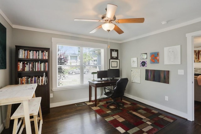 office featuring dark hardwood / wood-style flooring, ceiling fan, and ornamental molding