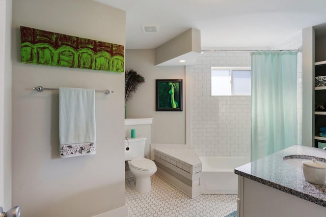 full bathroom featuring vanity, tile floors, shower / bath combo, and toilet