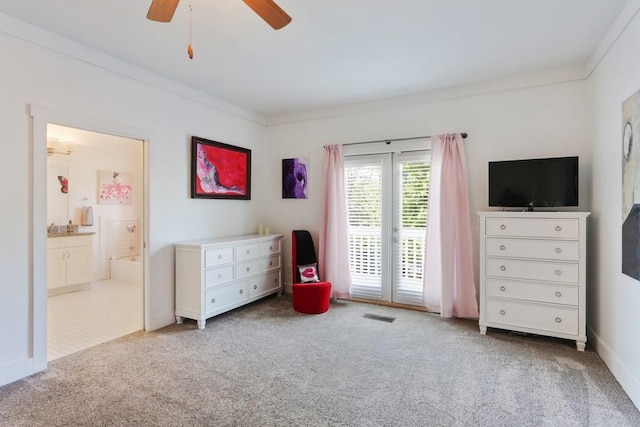 unfurnished bedroom with access to exterior, ceiling fan, ornamental molding, light carpet, and ensuite bath