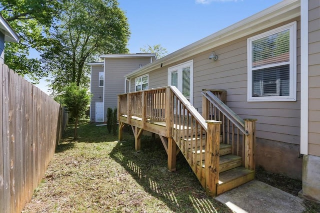 rear view of house with a wooden deck