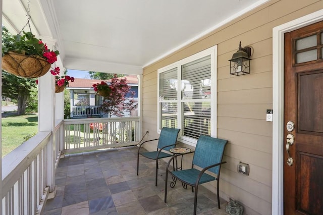 exterior space featuring covered porch