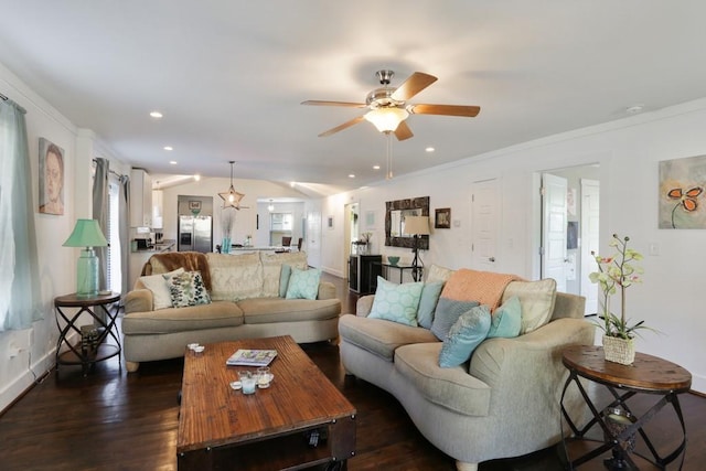 living room with ceiling fan and dark wood-type flooring