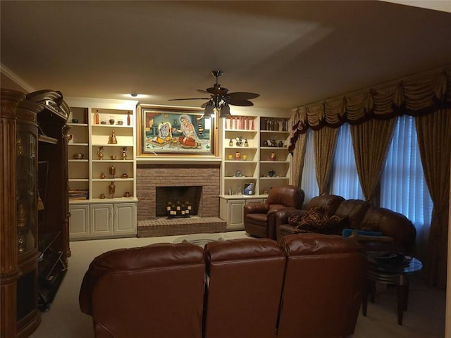 living room with carpet floors, ceiling fan, and a fireplace