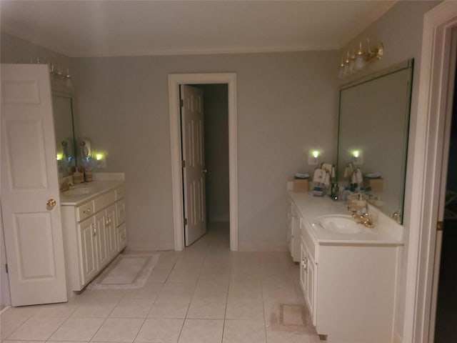 bathroom with double sink vanity and tile flooring