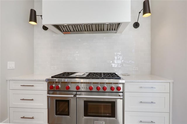 1068 Amsterdam Avenue Ne, Atlanta, GA 30306 - kitchen featuring tasteful backsplash, custom range hood, double oven range, and white cabinetry