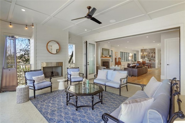 1068 Amsterdam Avenue Ne, Atlanta, GA 30306 - living room with plenty of natural light, coffered ceiling, ceiling fan, and hardwood / wood-style flooring