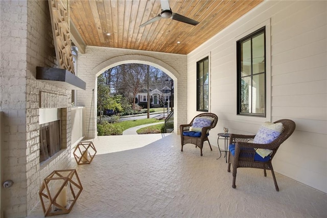 1068 Amsterdam Avenue Ne, Atlanta, GA 30306 - view of patio featuring ceiling fan and an outdoor brick fireplace