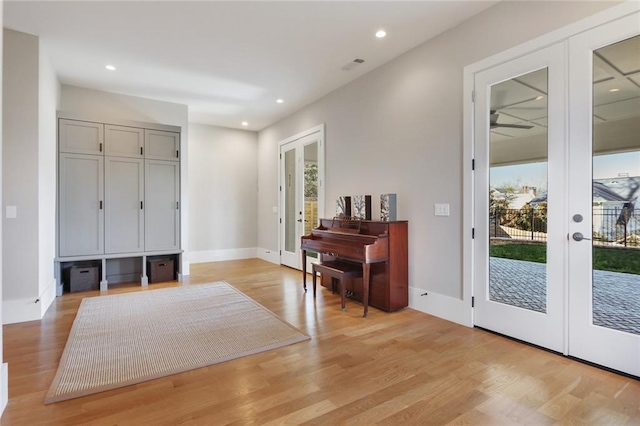 1068 Amsterdam Avenue Ne, Atlanta, GA 30306 - foyer entrance with french doors, light hardwood / wood-style floors, and plenty of natural light