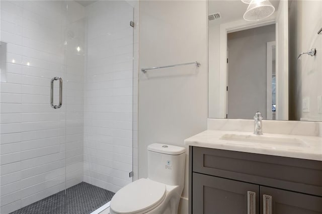 1068 Amsterdam Avenue Ne, Atlanta, GA 30306 - bathroom featuring an enclosed shower, toilet, and vanity with extensive cabinet space
