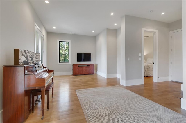 1068 Amsterdam Avenue Ne, Atlanta, GA 30306 - living room featuring light hardwood / wood-style floors