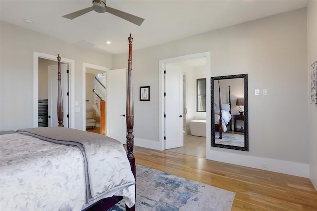 1068 Amsterdam Avenue Ne, Atlanta, GA 30306 - bedroom featuring light hardwood / wood-style floors, ensuite bath, and ceiling fan