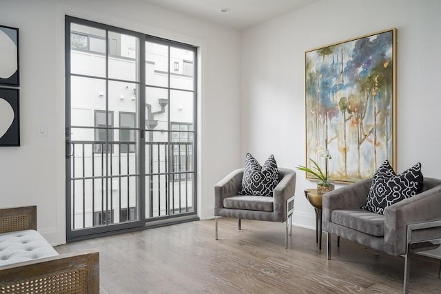 sitting room featuring hardwood / wood-style flooring