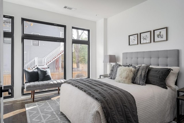 bedroom featuring dark wood-type flooring