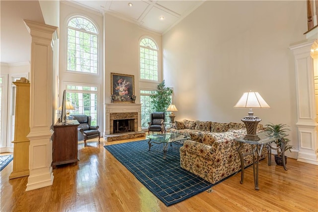 54 Old Fuller Mill Road Ne, Marietta, GA 30067 - living room with plenty of natural light, light hardwood / wood-style floors, a fireplace, and a towering ceiling